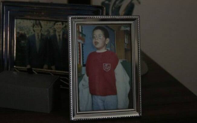 Fotos de família estão espalhadas pelo apartamento de Graham, como a do filho, Alex, que morreu aos nove anos Fotos de família estão espalhadas pelo apartamento de Graham, como a do filho, Alex, que morreu aos nove anos