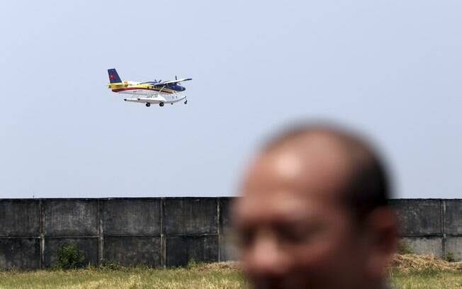 Equipes de resgate participam das buscas por vestígios do avião desaparecido com 239 pessoas a bordo (9/3). Foto: AP