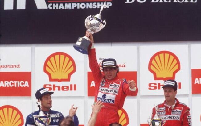 Pódio em 1991 também teve Riccardo Patrese, segundo, e Gerhard Berger, terceiro. Foto: Getty Images