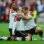 Wayne Rooney comemora com os companheiros Evra e Vidic após marcar