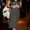 Mais uma vez de vestido (agora em comprimento midi) liso, em cor morna. Pelo jeito, Kate não faz questão de ser o centro das atenções... Foto de 28 de novembro de 2007. Foto: Getty Images
