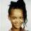 <span>Rihanna com 10 anos de idade</span> - <strong>Foto: Divulgação</strong>