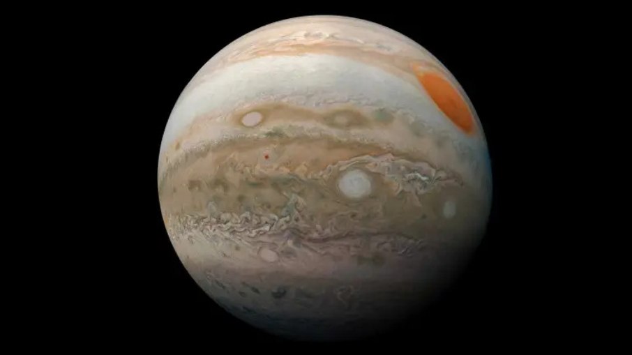 Maior planeta do Sistema Solar fica oculto pela passagem da Lua na exata posição à frente do gigante gasoso Maior planeta do Sistema Solar fica oculto pela passagem da Lua na exata posição à frente do gigante gasoso