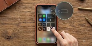 O que significa a letra E no canto superior do celular?