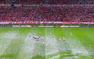 Chuva de papel picado atrasa duelo entre Internacional e Flamengo