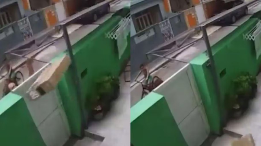 Imagens flagraram o momento em que entregador joga TV por cima de portão em casa do RJ