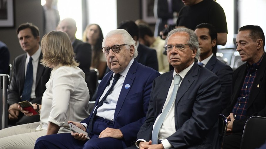 Paulo Guedes ao lado de Guilherme Afifi no painel O Ecossistema da Transição Energética Verde