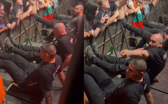 Seguranças fazem barreira para grade não cair em show