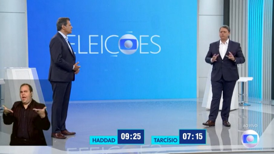 Haddad e Tarcísio durante debate da Globo