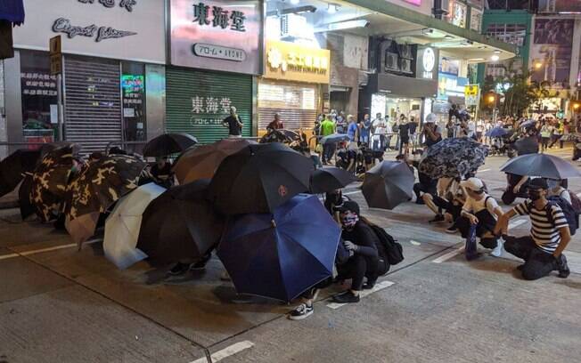Guarda-chuvas viraram símbolo dos protestos em Hong Kong