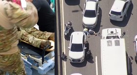 Motorista de caminhão esquece caçamba levantada e bate em viaduto