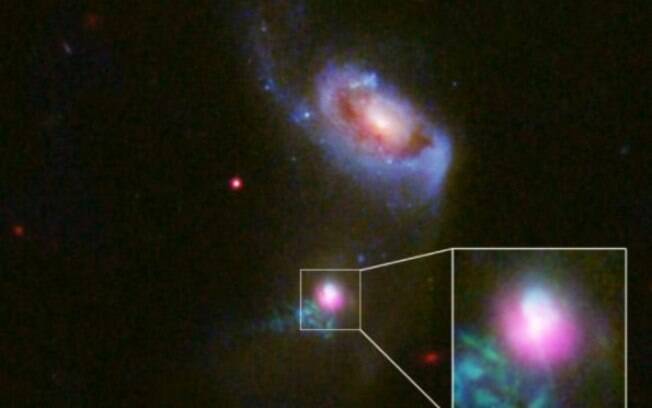 Buraco negro acorda de sono profundo e 'arrota' duas vezes depois de engolir gás cósmico de galáxia vizinha