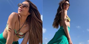 Patrícia Poeta dá o "play" nas férias e exibe corpão em praia