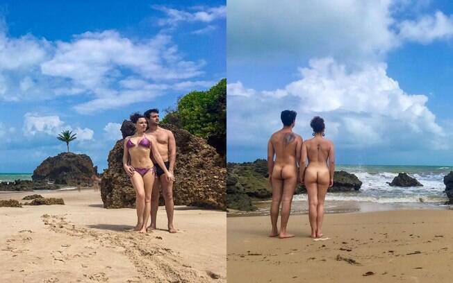 Braço e perna de pessoa sem roupa de costas em uma praia