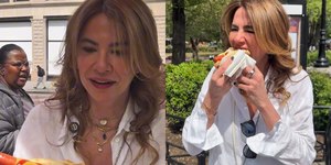 Luciana Gimenez come hot dog na calçada de Nova York