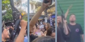 Homens armados circulam pelas ruas junto a moradores no RJ