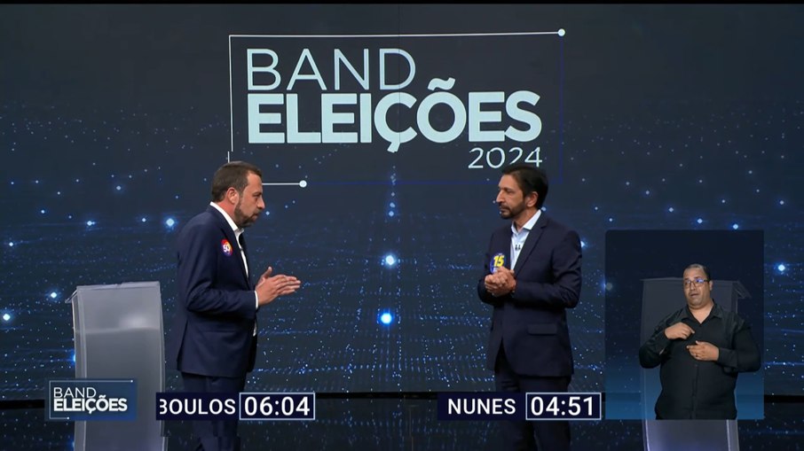 Guilherme Boulos e Ricardo Nunes em debate da Band