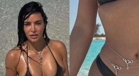 Kim Kardashian ostenta cintura fininha em fotos de biquíni