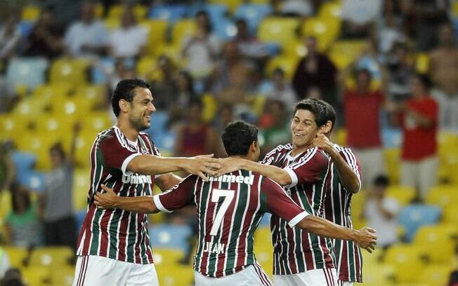 Jogadores do Fluminense comemoram o gol de Conca que garantiu a vitória do time sobre o Resende. Foto: Futura Press