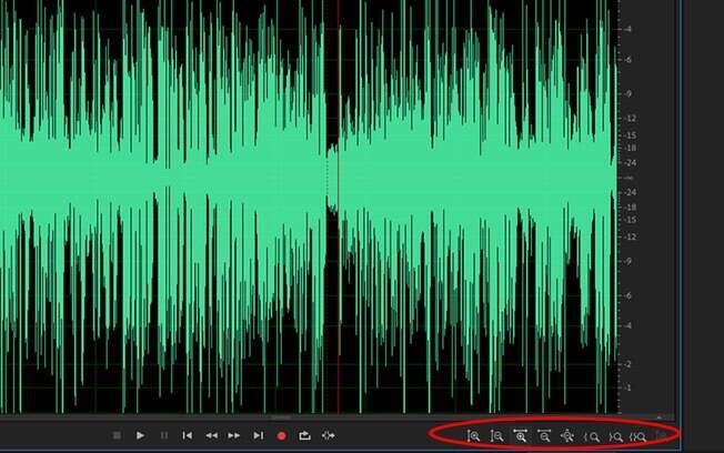 Você pode usar os ícones com os símbolos de lupas dar zoom na faixa de audio e ajudar a identificar os pontos com ruído