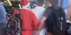 Policial disfarçado de Papai Noel prende foragido em rodoviária