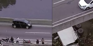 SP: caminhão cai de ponte na Marginal Tietê; quatro estão feridos