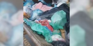 Bebê é encontrado morto em tambor usado para guardar lixo