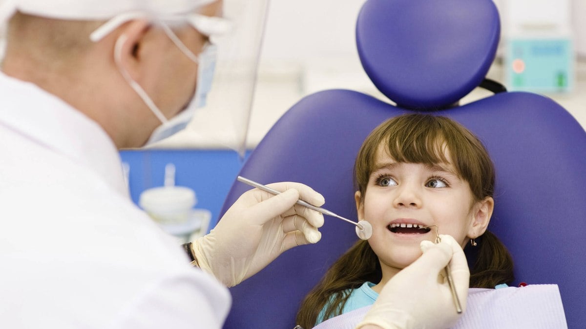 Criança no dentista