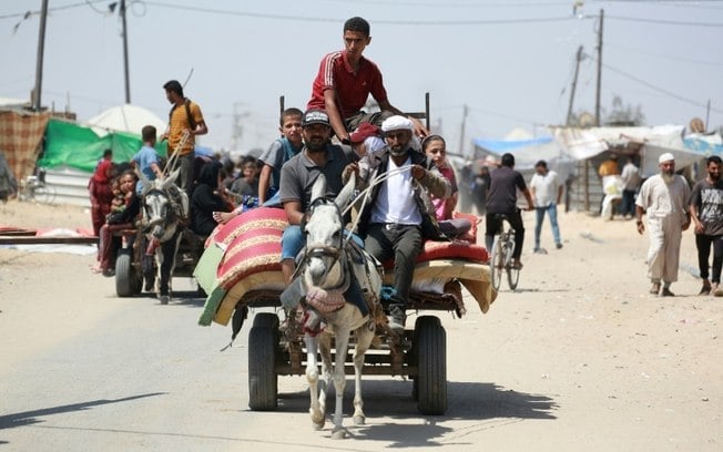 Deslocados palestinos em Rafah, no sul da Faixa de Gaza, em 19 de junho de 2024
