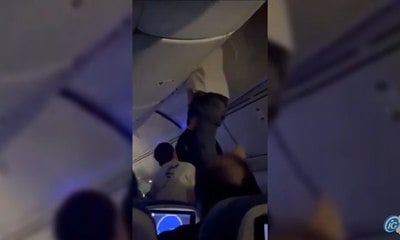 Passageiro é resgatado após ser lançado para teto de avião