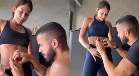 Vale tudo pela imagem: mini fã enfrenta vento para filmar corrida