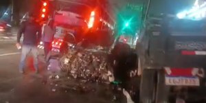 Carro bate em caminhões e fere jovem na Zona Leste de SP