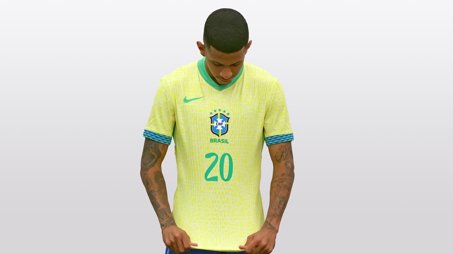 Savinho em ensaio fotográfico da Seleção