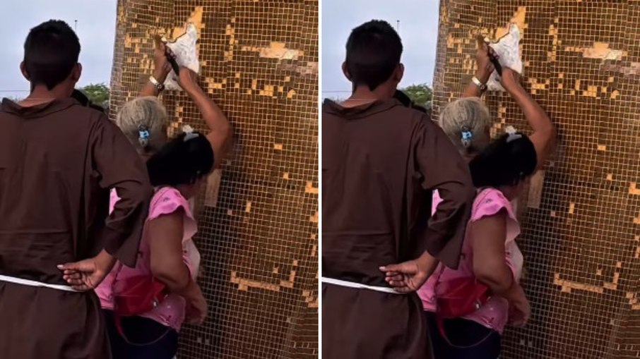 Romeiros arrancam ladrilhos de estátua de São Francisco Romeiros arrancam ladrilhos de estátua de São Francisco