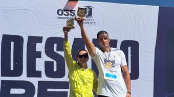 Atleta%20com%20defici%C3%AAncia%20visual%20busca%20topo%20do%20p%C3%B3dio