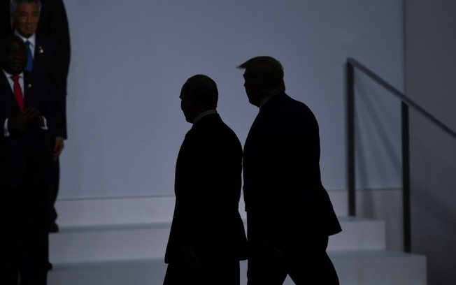 O presidente da Rússia, Vladimir Putin (à esquerda), e o presidente eleito dos Estados Unidos, Donald Trump