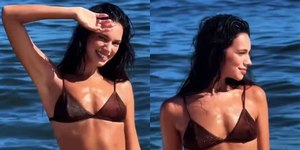 Ex-BBB Alane Dias posa de biquíni enquanto joga futevôlei