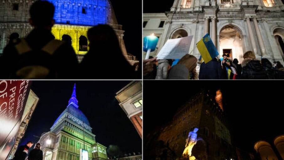 Prédios iluminados na Itália com as cores da bandeira da Ucrânia