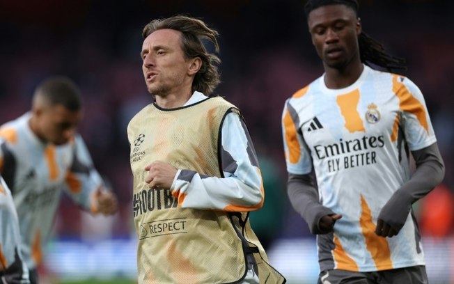 O meio-campista croata Luka Modric, do Real Madrid, se aquece antes de uma partida da Liga dos Campeões contra o Arsenal, em Londres, em 8 de abril de 2025 O meio-campista croata Luka Modric, do Real Madrid, se aquece antes de uma partida da Liga dos Campeões contra o Arsenal, em Londres, em 8 de abril de 2025