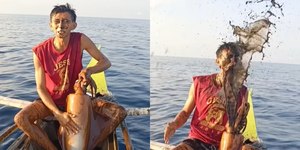 Lula surpreende pescador e reage com jato de tinta