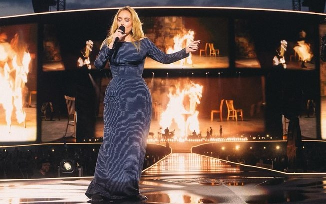 Adele para show para assistir à final dos 100m feminino na Olimpíada de Paris