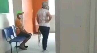 Mulher leva marido amarrado 