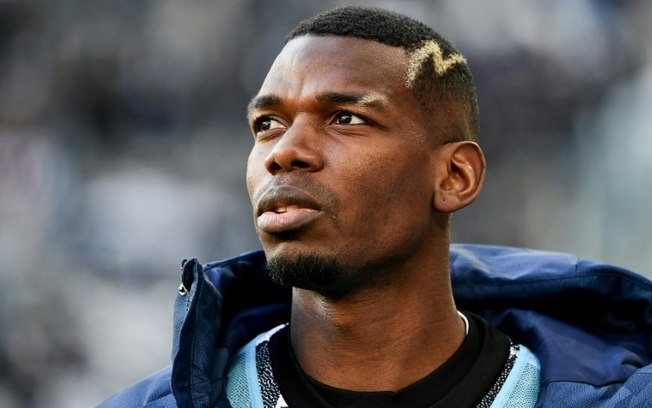 (ARQUIVOS) Meia francês da Juventus, Paul Pogba, assiste à partida entre Juventus e Monza em Turim, em 29 de janeiro de 2023. Clube rescindiu contrato do meia recentemente