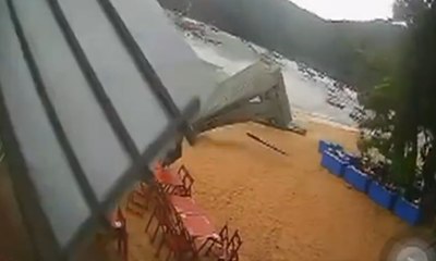 Telhas passam raspando por pessoas em Ilha Grande (RJ) durante ventania