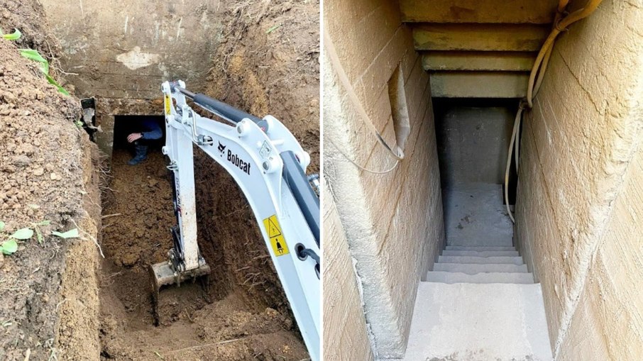 A entrada do bunker pode ser vista parcialmente obstruída por toneladas de solo durante a escavação