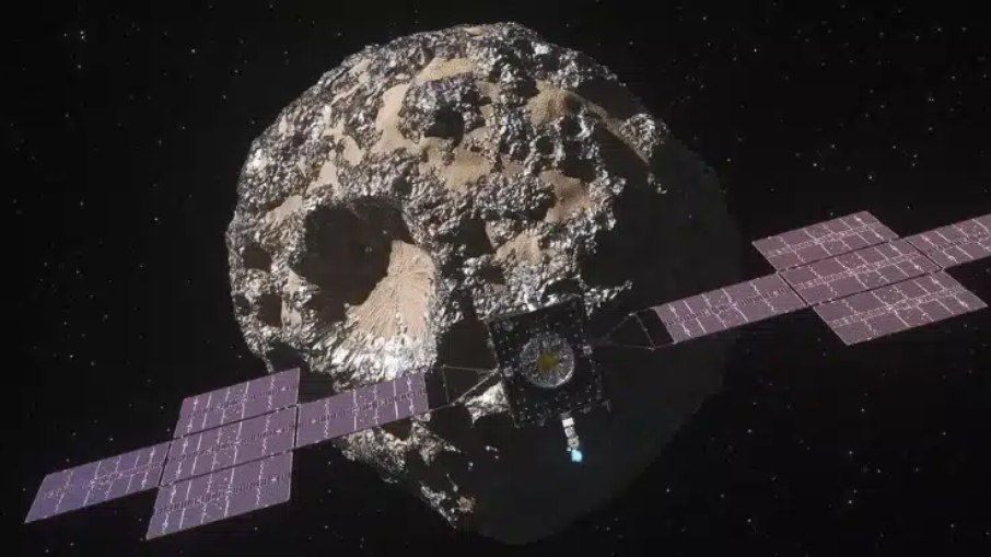 Uma ilustração da espaçonave Psyche da NASA se aproximando do asteróide Psyche
