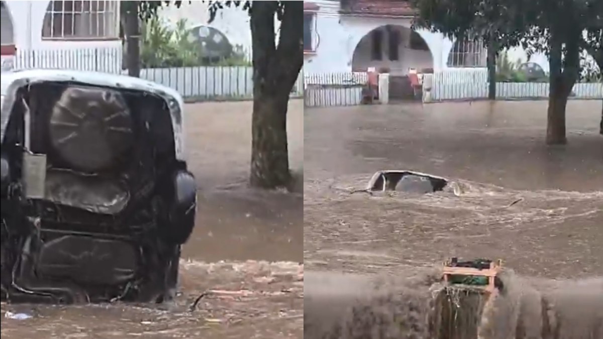 Veículo é 'engolido' por bueiro durante o temporal Veículo é 'engolido' por bueiro durante o temporal