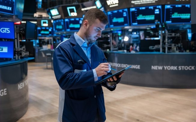 Um corretor de ações da NYSE no pregão de Nova York