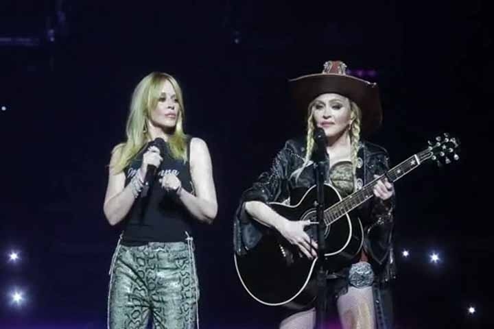 A cantora e atriz Kylie Minongue fez um dueto especial com Madonna no espetáculo em Miami. A performance fez referência ao Dia Internacional das Mulheres, em 8 de março.  

 Reprodução: Flipar