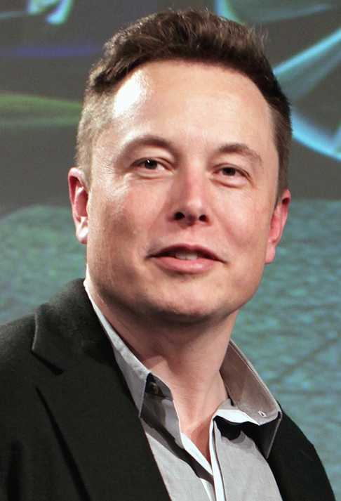 A fortuna de Elon Musk já alcançou a casa do trilhão quando se fala na moeda brasileira (real). Ele investe na Space X e também é dono da Tesla, uma empresa de tecnologia e automóveis focada na produção de veículos elétricos e soluções de energia sustentável, como baterias e painéis solares.  Reprodução: Flipar